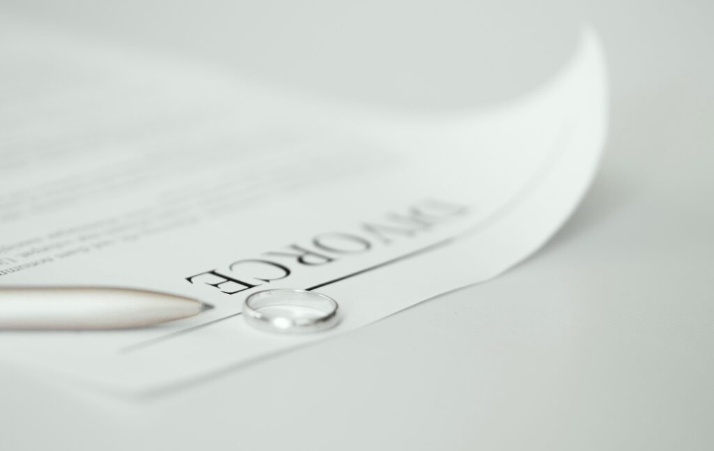 close up divorce contract with rings table 1